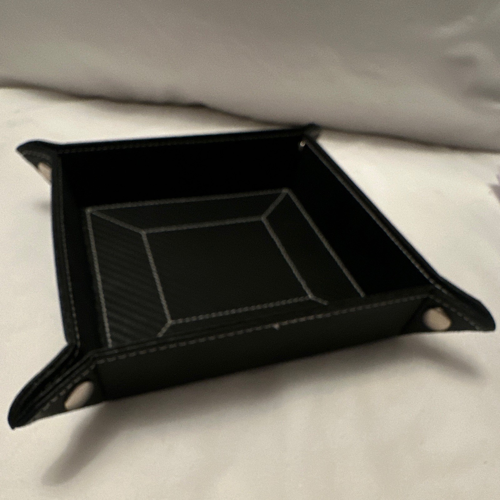 Black Carbon Coin Tray. See picture for condition. Sold as is.