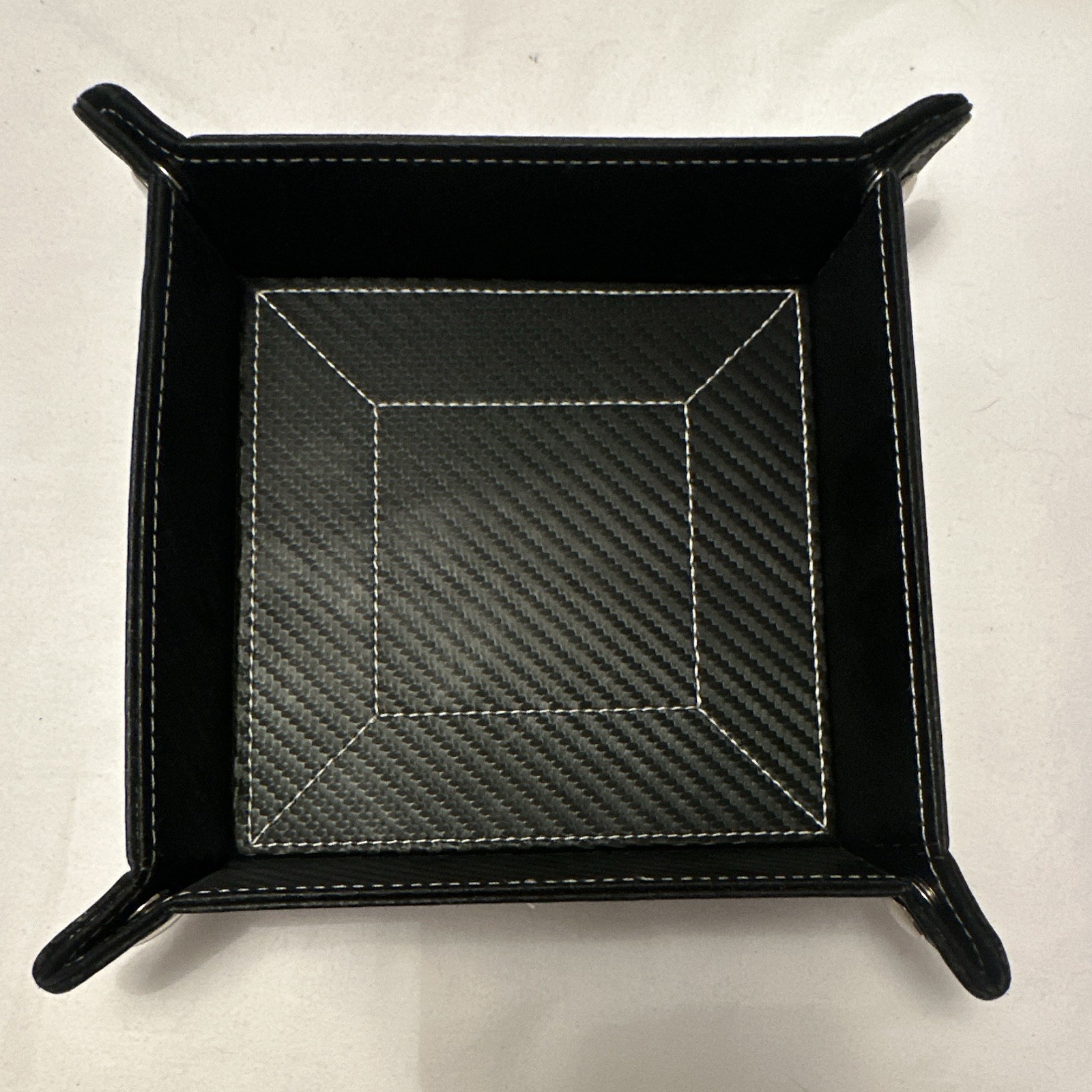 Black Carbon Coin Tray. See picture for condition. Sold as is.